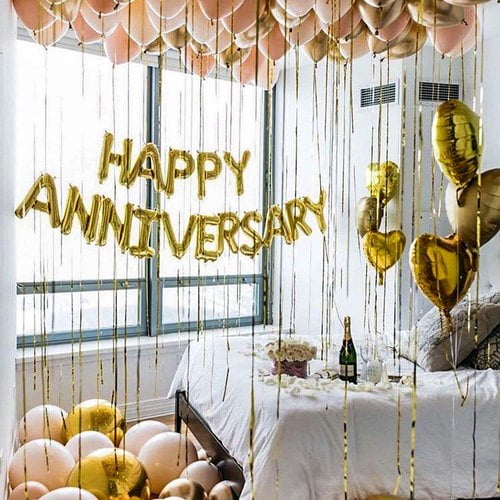 happy anniversary balloons gold set up