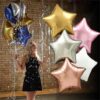 star balloons woman holding star balloons 18 inch gold rose gold silver